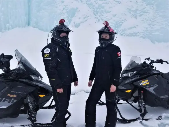 women snowmobiling