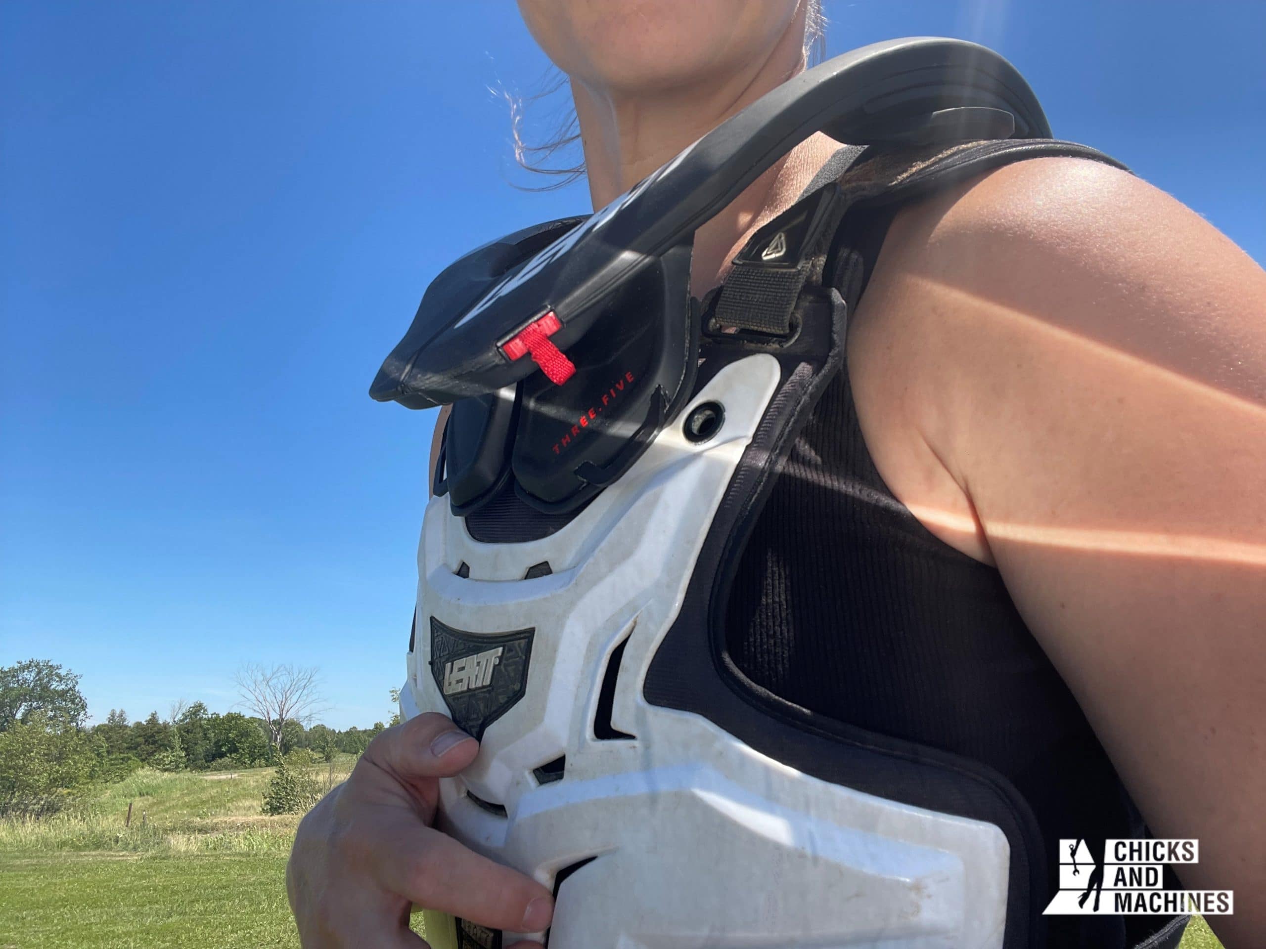 Cindy wearing the Leatt GPX 3.5 neck brace and the chest protector