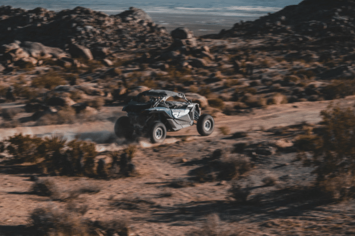 The Maverick X3 has the toughness you need. Source: https://can-am.brp.com/off-road/ca/en/