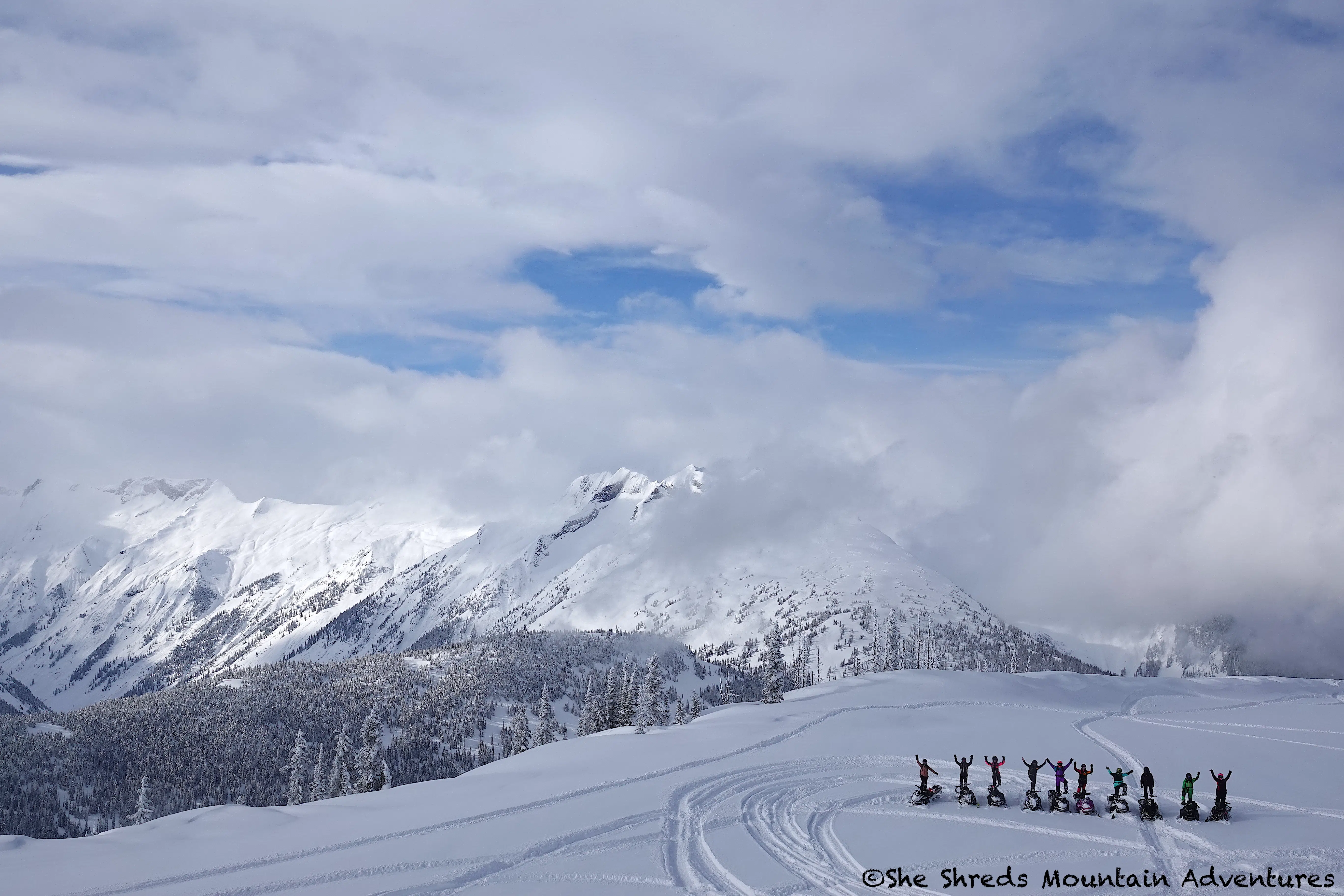 Sled Revelstoke BC Bluebird day Mountains She Shreds Mountain Adventure @sheshredsmountainadventures