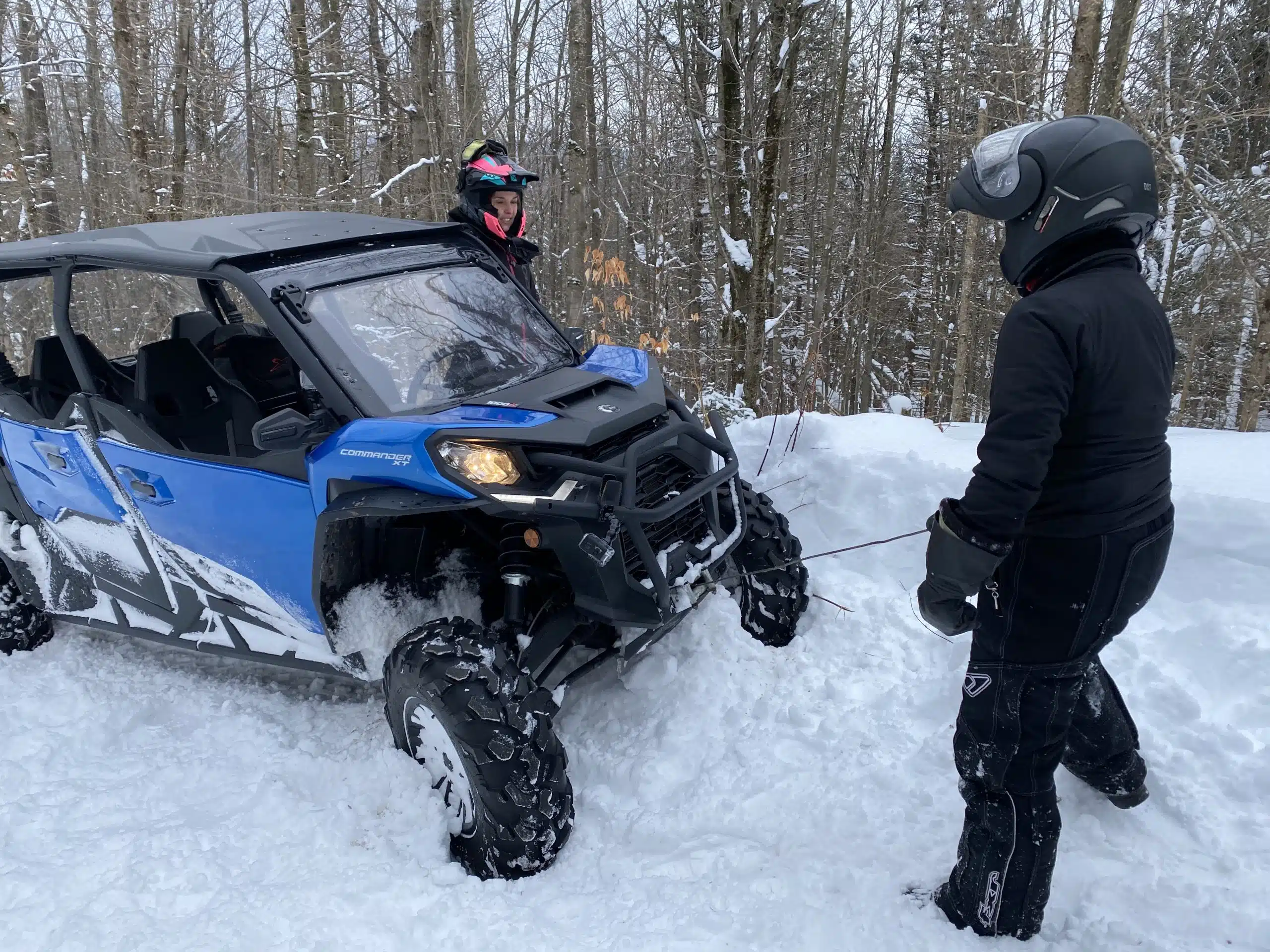 The team roll up their sleeves and try everything they can to free the vehicule